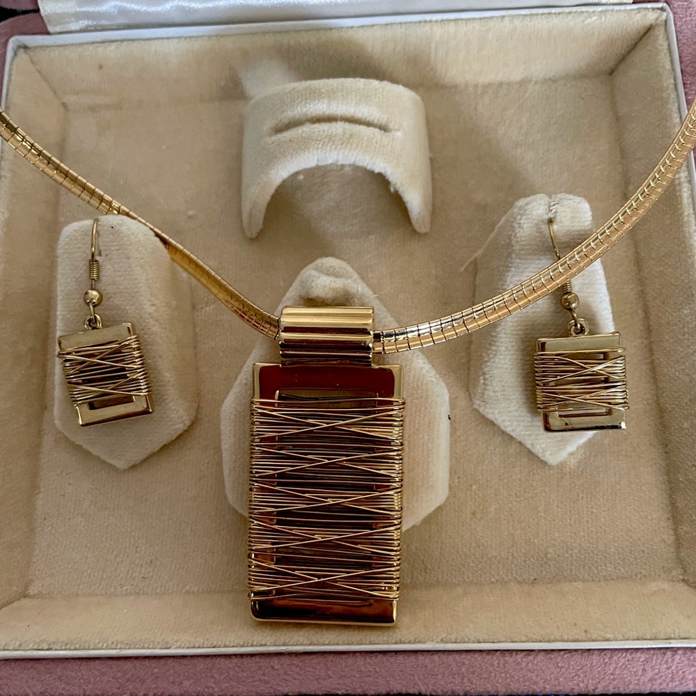 Gold wrapped necklace with matching earrings.